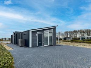 Chalet in Zeeland with Private Jetty