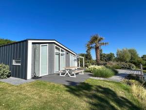 Holiday Home in Zeeland with Streamside Terrace