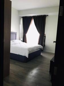 Long term Rental of 2 BR Condo @Malate, Manila (opp Robinson Place Mall)