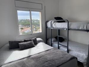 Orsa-Ático con vista al mar y piscina