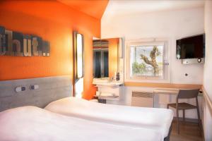 Hotels Ibis Budget Frejus Capitou : photos des chambres
