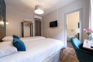 Hotels Contact Hotel du Commerce et son restaurant Cote a Cote : photos des chambres