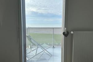 Appartements Face a la mer immense : photos des chambres