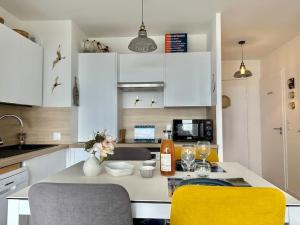 Appartements Face a la mer immense : photos des chambres