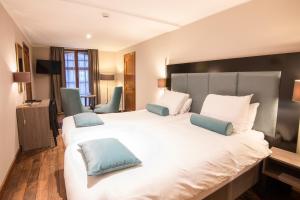  Twin Room with River View room in Hotel de la Poste - Relais de Napoleon III