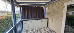 Mobil home 693 à la réserve 8 personnes avec terrasse couverte