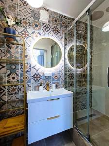 Appartements Au Petit Trianon Bleu : photos des chambres