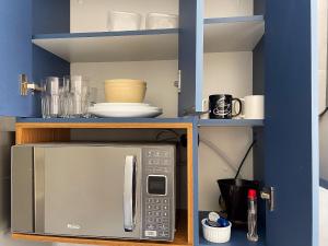 Apto 1 quarto, Centro, Cambuí, Guanabara, 1 vaga garagem, prox. a mercado, academia, hospital