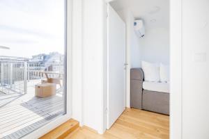 SYMPHONY Apartments 38 - Modern Loft with Terrace and Grill in Central Location
