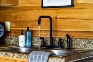 The Copper Bird Mid Century Hot tub Arcade Gameroom Rock Climbing wall