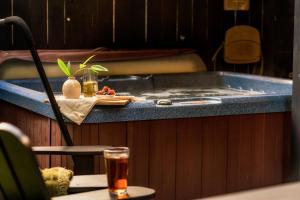 The Copper Bird Mid Century Hot tub Arcade Gameroom Rock Climbing wall