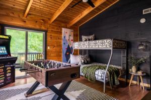 The Copper Bird Mid Century Hot tub Arcade Gameroom Rock Climbing wall