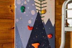 The Copper Bird Mid Century Hot tub Arcade Gameroom Rock Climbing wall