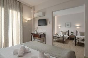 Superior Quadruple Room with Sea View room in Minavra Hotel