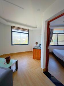 Căn hộ 1 Phòng ngủ có Ban công và Nhìn ra cảnh Núi non  (One-Bedroom Apartment with Balcony and Mountain View  )