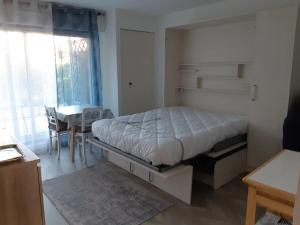 Appartements STUDIO AVEC TERRASSE PLEIN SUD - RESIDENCE LE FENIL AVENUE DE VERDUN A CABOURG : photos des chambres