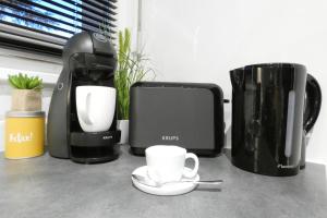 Appartements Homey Cute - Parking inclus - Proche Geneve : photos des chambres