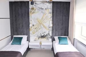 Skarbek Iława, pokoje i apartamenty