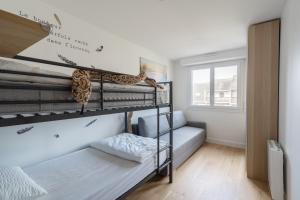 Appartements Esprit Zen - Avec parking 10min a pied de la plage : photos des chambres
