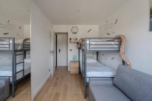 Appartements Esprit Zen - Avec parking 10min a pied de la plage : photos des chambres
