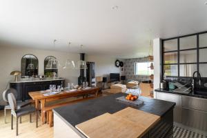 Maisons de vacances La perle de mer - Charmante maison avec jacuzzi : photos des chambres