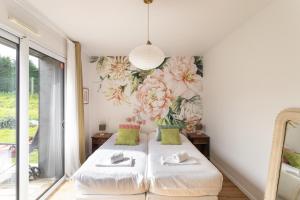 Maisons de vacances La perle de mer - Charmante maison avec jacuzzi : photos des chambres