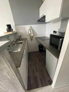 Appartements Charmant appartement : photos des chambres