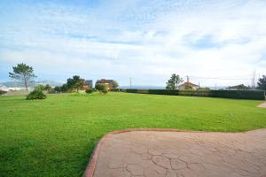Apartamento con jardín en Playa de Corrubedo