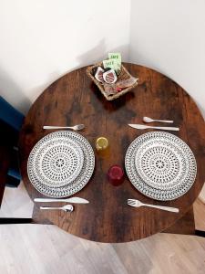 Appartements Studio B aux pieds des Thermes : photos des chambres
