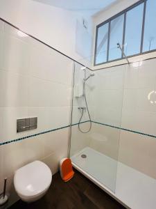 Appartements RhizHome - Coeur de ville, appartement spacieux : photos des chambres