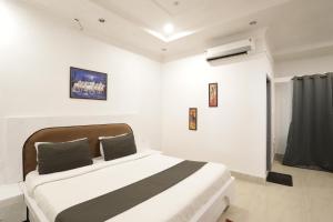 Goroomgo Hotel Hi5 Stay Near Care Hospital