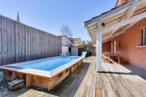 Maisons de vacances Escapade familiale avec piscine a Ares : photos des chambres