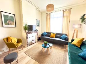 Maisons de vacances 4 Ch - 10 pers - Grande Maison - Parking - Jardin - BBQ : photos des chambres