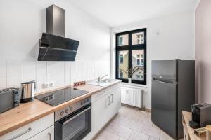LeHaStays - Apartment Buckau 14 I Küche I WLAN I SmartTV I Innenhof