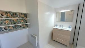 Maisons de vacances VILLA CASA KOKO 10 PERS piscine chauffee, petanque, ping pong VIEUX-BOUCAU : photos des chambres