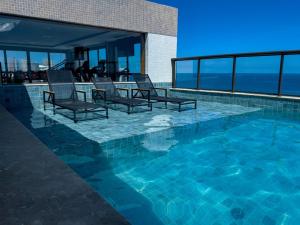 Studio 250mts da PRAIA I Piscina com VISTA PANORÂMICA em ROOFTOP I ACADEMIA I HOME OFFICE I WiFi 100Mbps