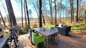 Appartements LE COTTAGE VUE LAC-2 velos-Village Vacances Nature de 70ha! avec piscines et animations : photos des chambres