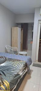 Tower Basella no 2025 - Apartemen Springlake Summarecon Bekasi