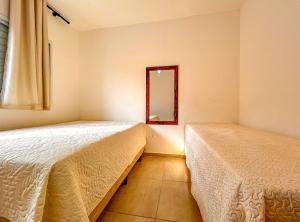 Apto com WiFi a 3 min de carro da Praia da Enseada