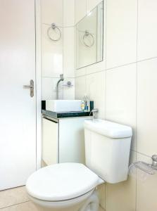 Apto com WiFi a 3 min de carro da Praia da Enseada