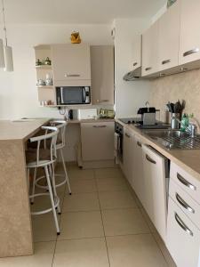 Appartements 3p, grd terrasse, jardin, centre-ville, 150m de la mer : photos des chambres