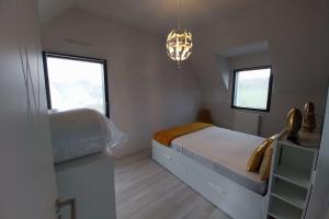 Maisons de vacances Beautiful new modern house : photos des chambres