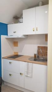 Appartements F3 avec salle de jeux, terrasse et grand jardin : photos des chambres
