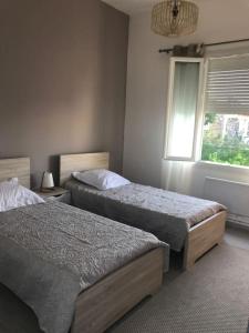 Maisons de vacances Maison 21, agreable maison de ville avec piscine : photos des chambres