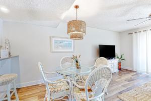 Recently updated resort condo with 2 pools, 2 balconies, ocean views, BBQ, & WD