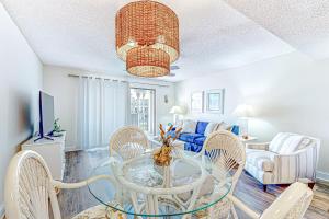Recently updated resort condo with 2 pools, 2 balconies, ocean views, BBQ, & WD