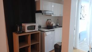 Appartements Grand Studio Independant a 30 minutes de Paris (RDC d-un pavillon) dans village bord de Seine : photos des chambres
