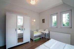 APARTAMENTY TUŹNIKOWIE