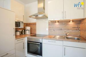 Villa van Harten Ferienwohnung "Kaptain"