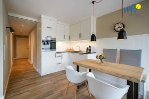 Achterhus - Ferienwohnung "wat nmeer"